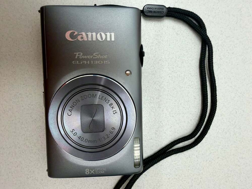 Canon PowerShot ELPH 130 IS 16.0MP Digital Camera Bundle with Case and Charger